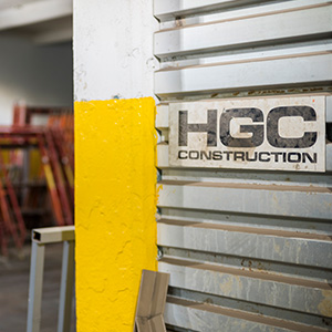 HGC logo on metal wall