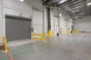 Interior, large warehouse and dock bays