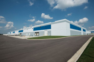Exterior, industrial delivery station, back with loading docks