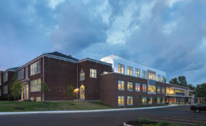 Exterior of brick elementary school at dusk