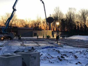 early morning concrete pour as team begins sycamore symmes renovations