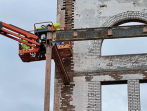Brick repairs on the historic clock tower at Factory 52